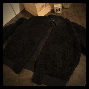Black faux fur-fluffy coat.